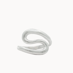 A silver s-shaped wrap ring with a smooth, polished finish, shown on a plain off-white background.