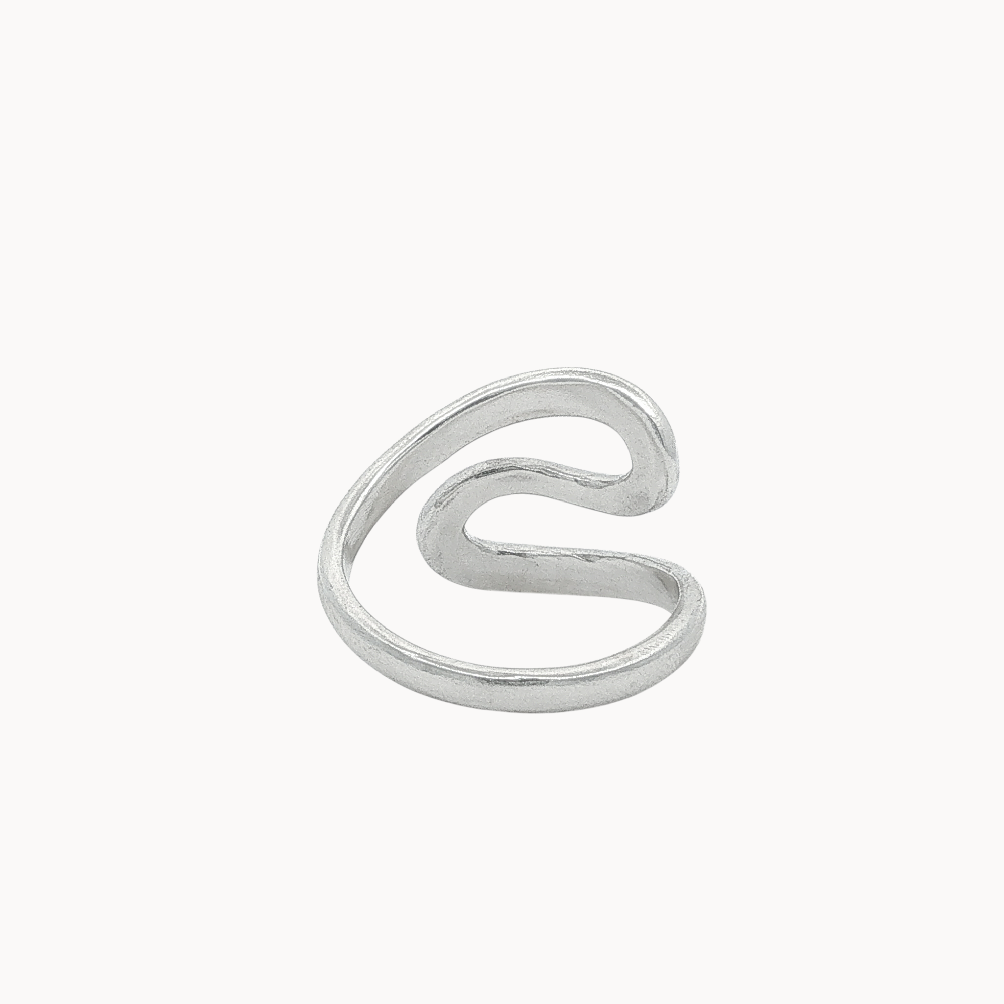 Back view of a minimalist silver open ring with a wavy, flowing S-shaped design, photographed on a clean, solid off-white background.
