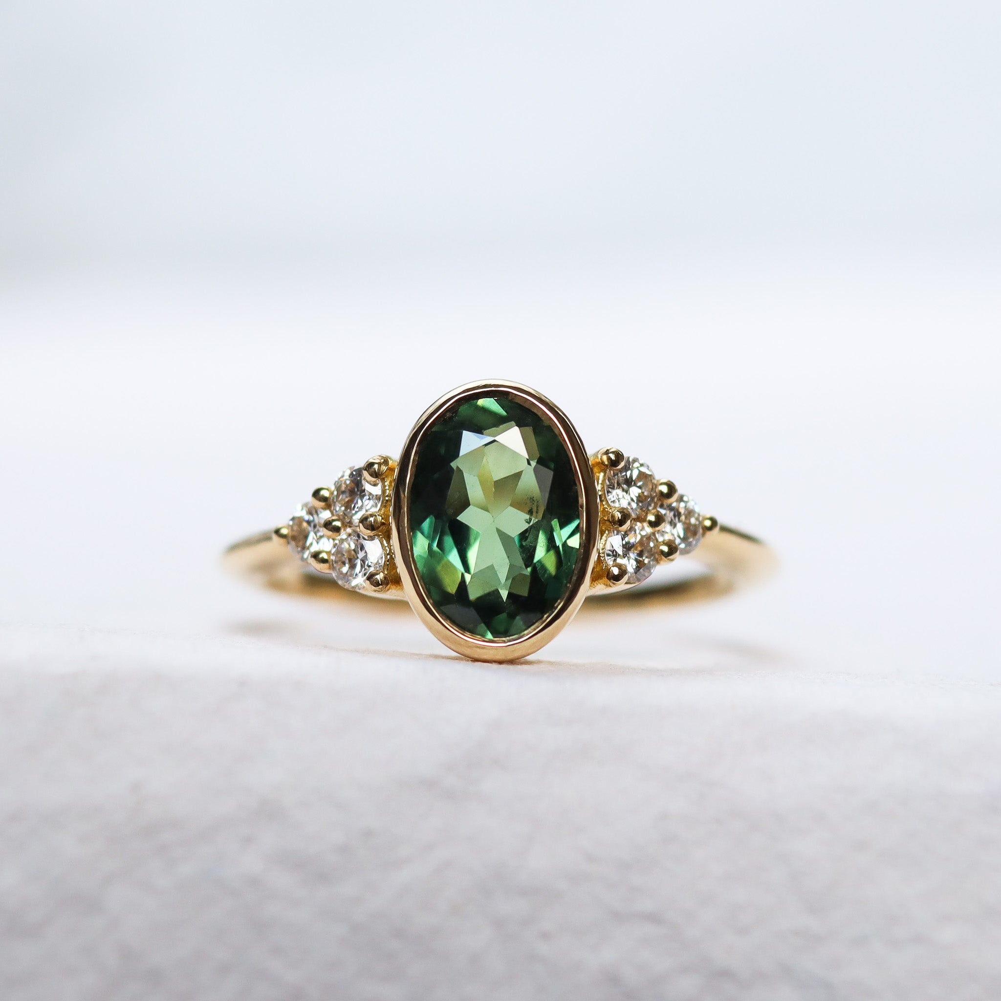 Oval Green Sapphire Diamond Cluster Engagement Ring