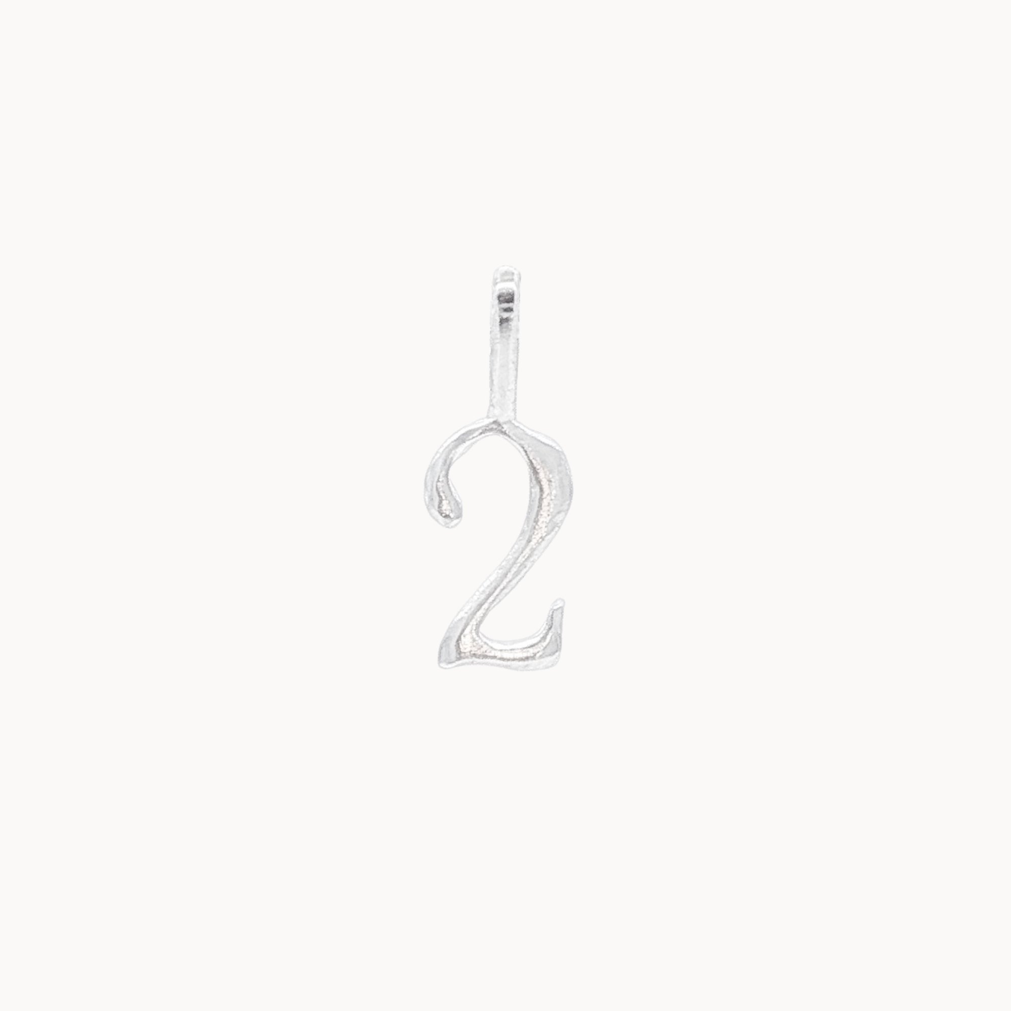 Silver number '2' pendant on a white background