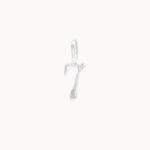 Silver seven pendant on a white background