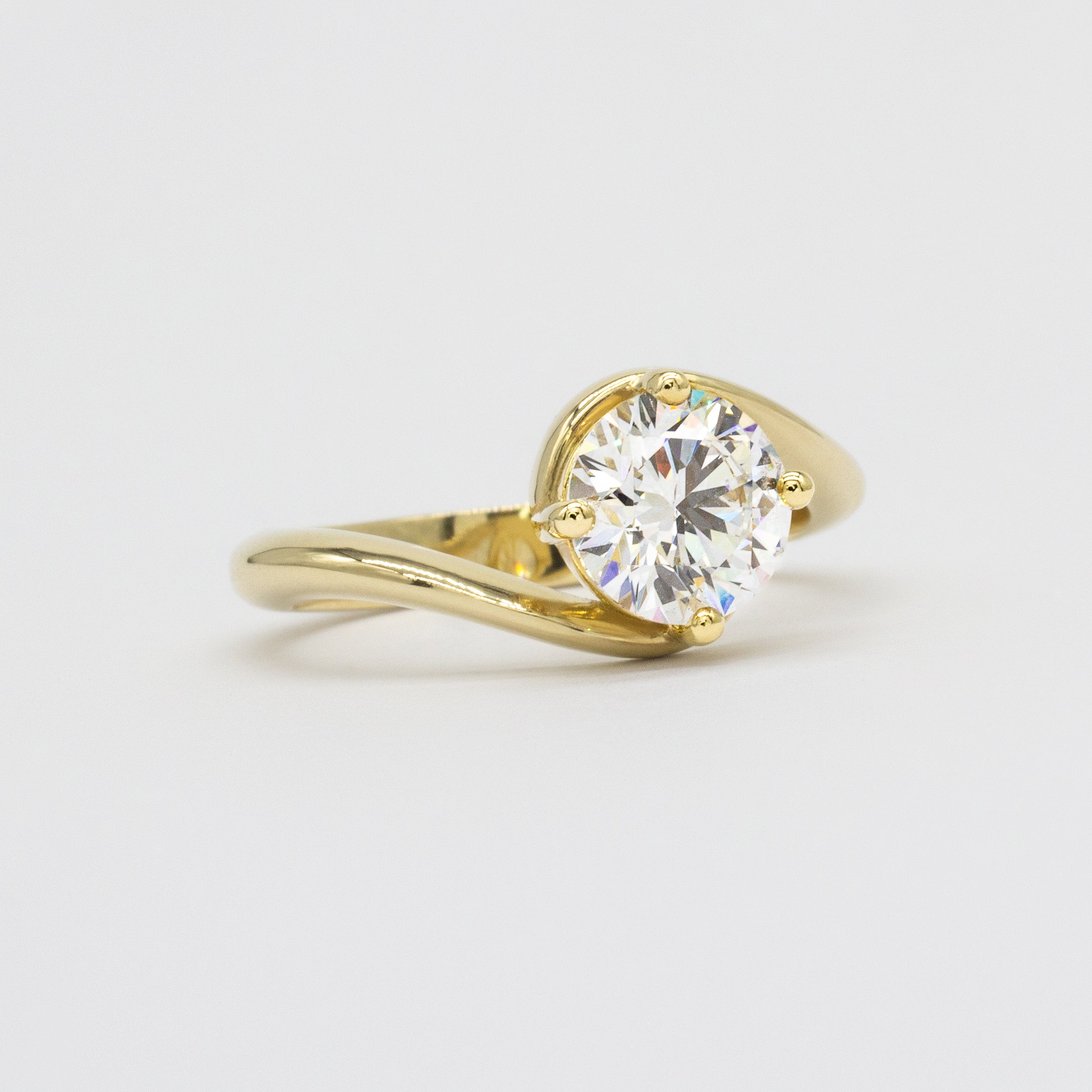 Round Diamond Wave Engagement Ring