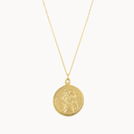 gold saint christopher necklace on a white background