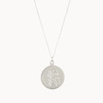 silver round pendant necklace with saint christopher design on a white background