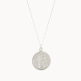 silver round pendant necklace with saint christopher design on a white background