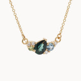 Gold necklace with a pear-shaped sapphire, round blue and green sapphires and diamonds