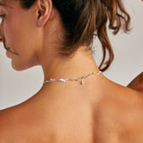 Back view of model wearing Silver Leaf Necklace