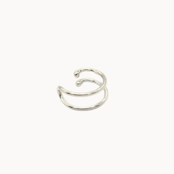 double fake helix piercing ear cuff in silver on white background