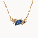 Gold necklace with blue and yellow sapphires and round diamonds