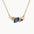 Gold necklace with blue and yellow sapphires and round diamonds
