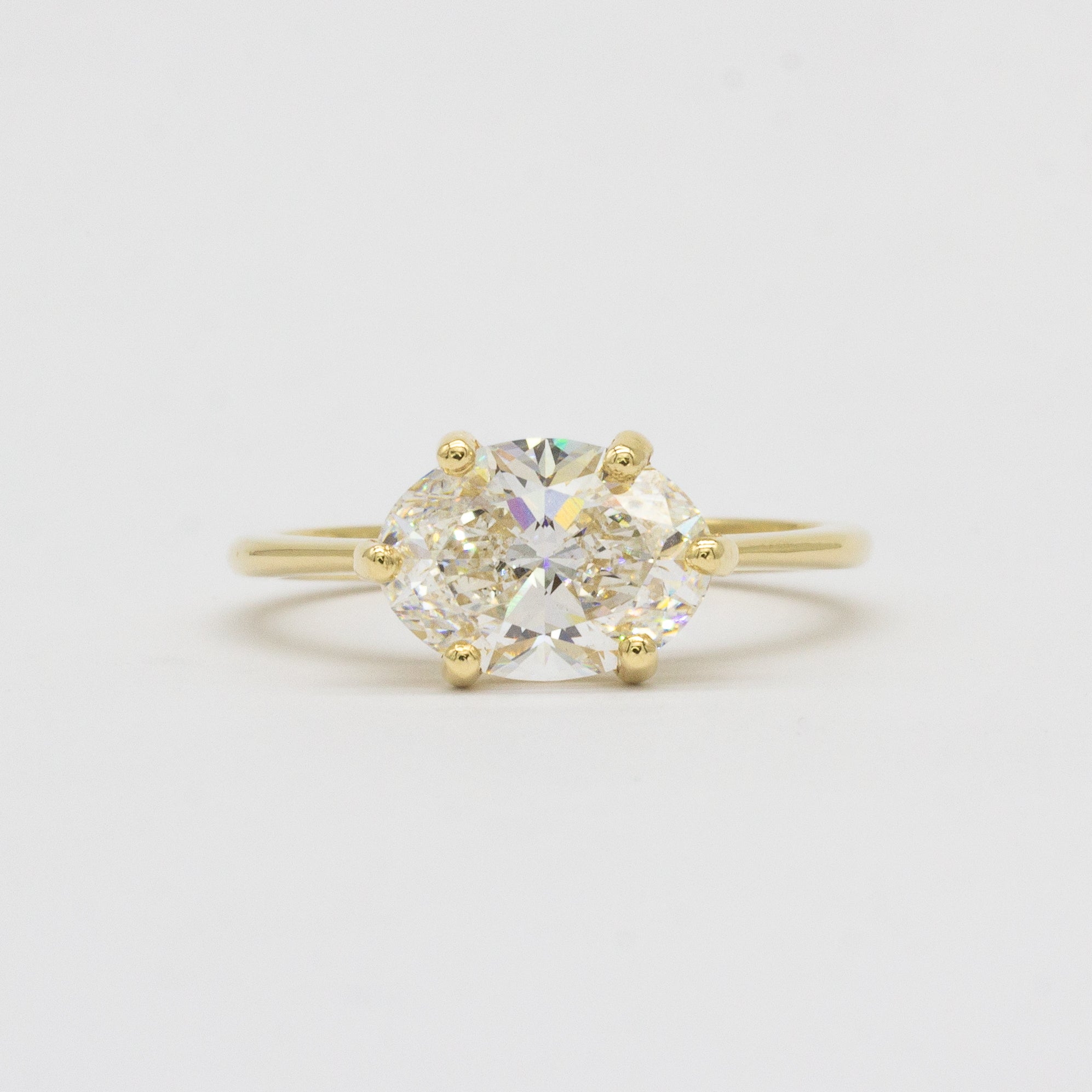 Solitaire East-West 6-Claw Diamond Engagement Ring