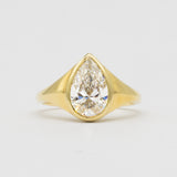 Statement Bezel Set Pear Diamond Engagement Ring
