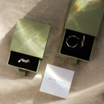 wave ring and hoops in green gift boxes and wild fawn care card