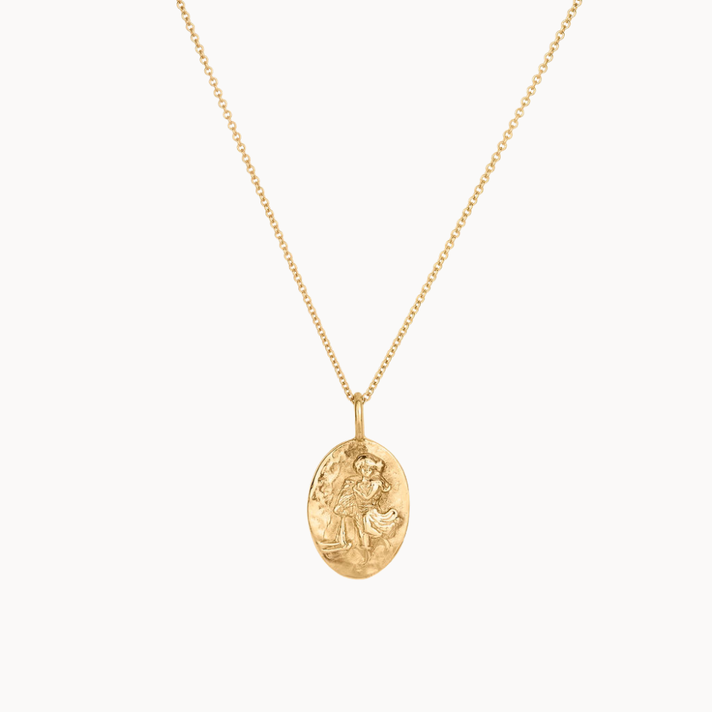 Gold aquarius necklace with a pendant on a white background