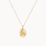 gold aries necklace with oval pendant on a white background