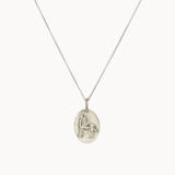 silver aries necklace with oval pendant on a white background