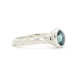 white gold Solitaire Blue Sapphire Molten Organic Engagement Ring side view on a white background