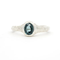 Solitaire Blue Sapphire Molten Organic Engagement Ring on a white background