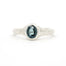 Solitaire Blue Sapphire Molten Organic Engagement Ring on a white background