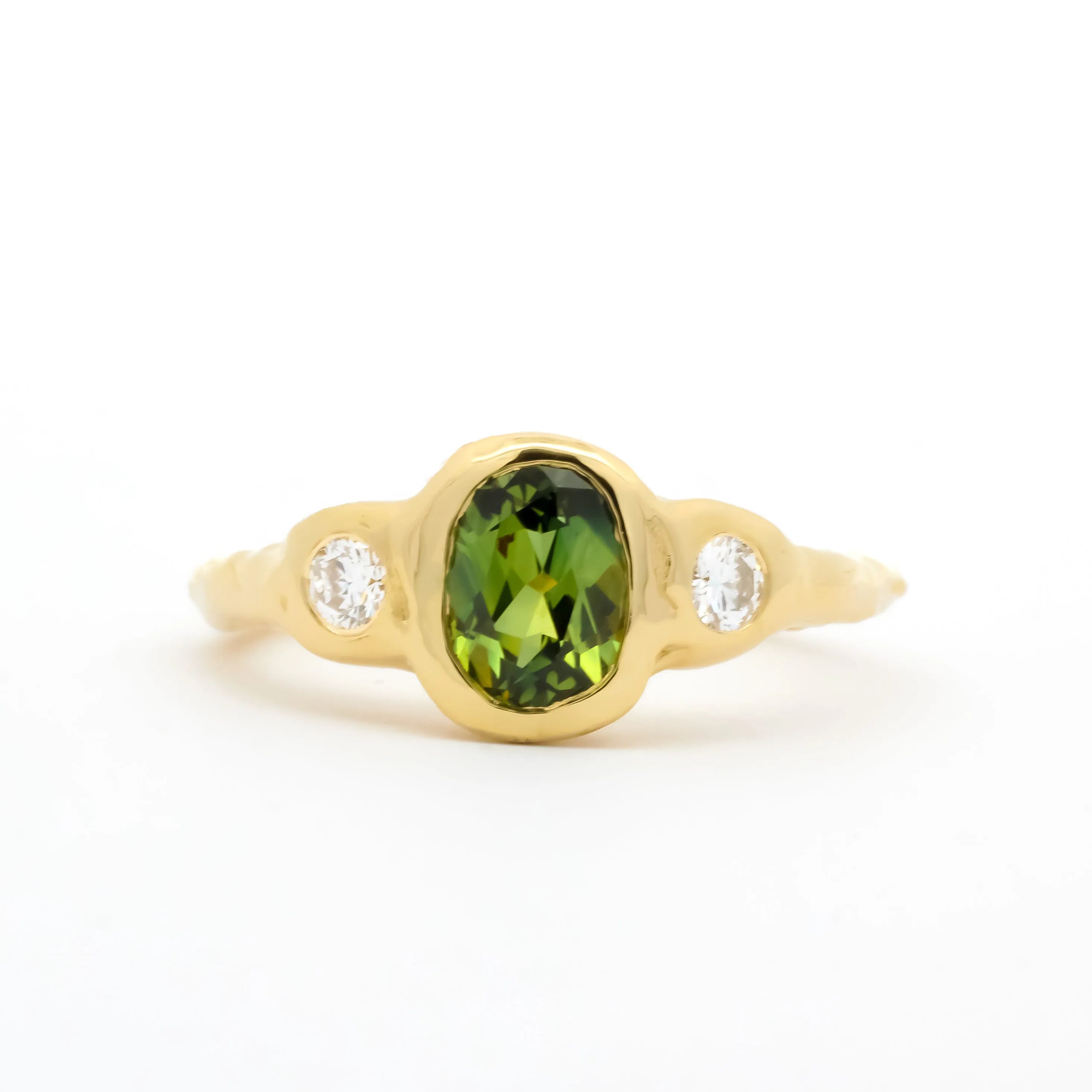 yellow gold Oval Green Sapphire Molten Organic Engagement Ring with round diamonds on a white background
