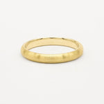 Gold 3mm brushed wedding ring on a white background