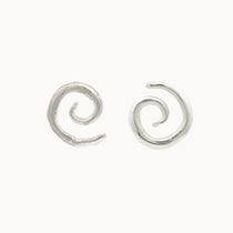 Silver spiral earrings on a white background
