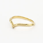 side angle of 2mm chevron wedding ring in gold on white background
