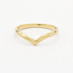 Gold rounded chevron wedding ring with a V-shaped design on a white background