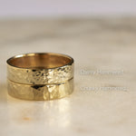 two hammered wedding rings stacked with labels 'dainty hammered' and 'chunky hammered'