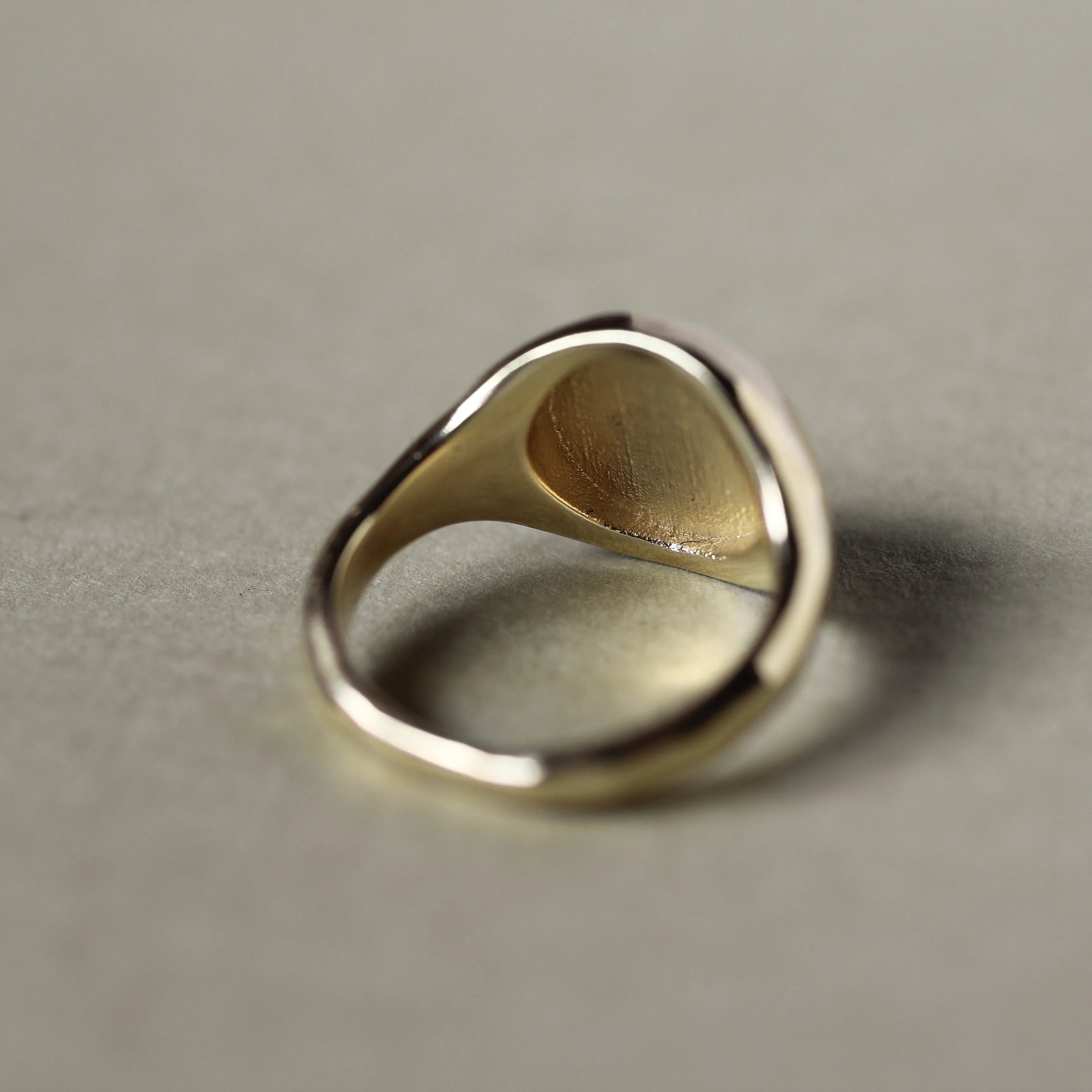 back view of gold signet ring