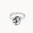 A sterling silver ring featuring a knotted design on the front, set against a plain off-white background.