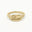 solid gold word ring with the word Loved engraved on a white background
