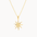 Gold sun-shaped pendant on a chain against a white background