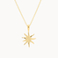 Gold sun-shaped pendant on a chain against a white background