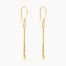Gold dangle earrings with molten gold bar on a white background