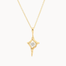Gold necklace with a open star shaped pendant with round diamond in the middle on a white background