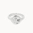 A textured sterling silver oval signet ring with a rough, organic-shaped face, shown on a plain off-white background.