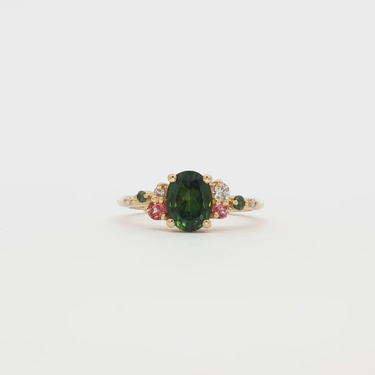 green pink and teal sapphire engagement ring with scattered diamonds 360 video