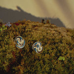 silver knotted stud earrings in moss