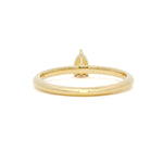 back view of a tiny pear diamond engagement ring