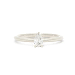 A pear-cut diamond engagement ring set on a slim white gold or platinum band, photographed against a seamless white background.