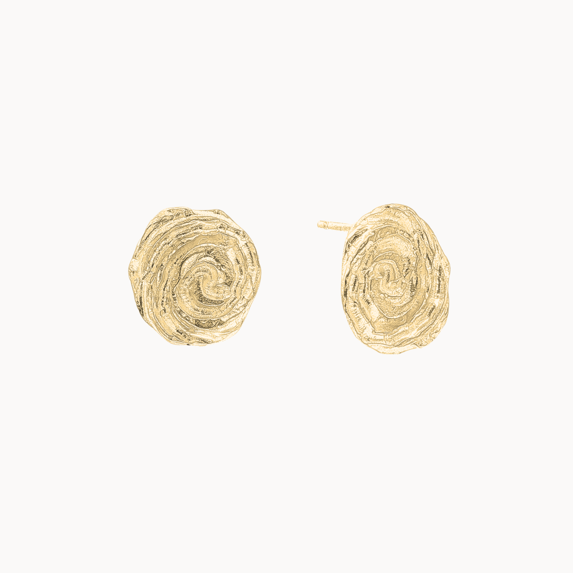 Pair of gold spiral stud earrings with the one slightly outturned showing the ear pin on a white background