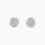 A pair of textured silver stud earrings with a spiral rose design, shown on a plain off-white background.