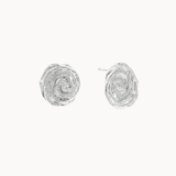 spiral stud earrings in silver with the right outturned revealing the ear pin against a plain off-white background