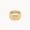 A chunky, textured gold ring with a geometric, faceted design, shown against a plain off-white background.