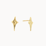 Gold four-point star stud earrings on a white background