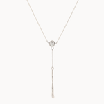 white gold y-shaped lariat necklace with a small round diamond pendant and molten bar detail on a white background